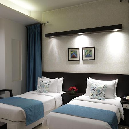 Rockland Hotel, C.R Park New Delhi Exteriör bild