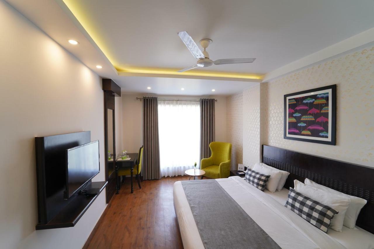 Rockland Hotel, C.R Park New Delhi Exteriör bild